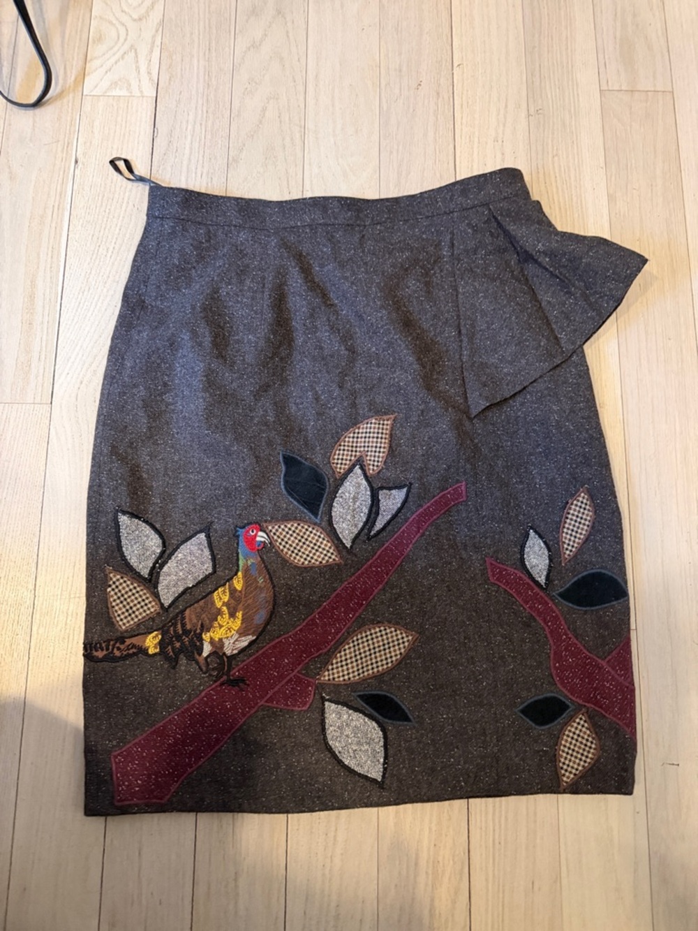 Floreat charcoal gray pencil skirt with embroidered bird and burgundy branches